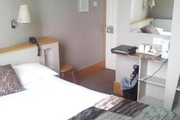 בית מלון כפרי Leeson Inn Downtown