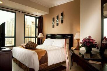 هتل Grand Tropic Suites