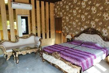 استراحتگاه Mann The Palm Retreat