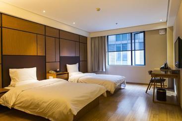 هتل Ji Yantai Binhai Plaza