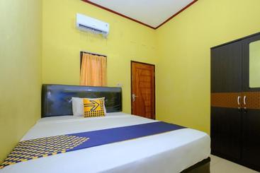 هتل Spot On 2732 Sandy Guesthouse