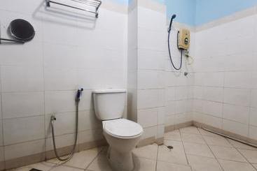 هتل Oyo 90061 Kuhara Court Apartment Suite