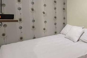 هتل Aimer Guest House Syariah Mitra Reddoorz