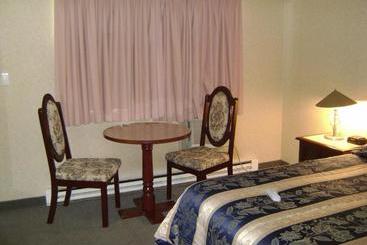 Magnuson Hotel Grace Inn