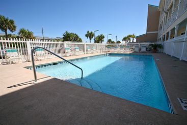 هتل Resortquest Rentals At Crystal Sands East & West