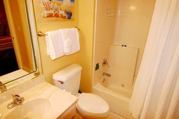 هتل Resortquest Rentals At Crystal Sands East & West