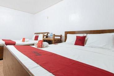 هتل Reddoorz Hostel At Megans Paradisio Beach Resort