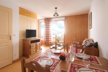 هتل Résidence Odalys Les Chalets De La Porte Des Saisons