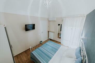 تختخواب و صبحانه La Casa Di Achille