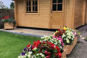 פנסיון Cosy Log Cabin   The Dookit   Fife