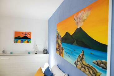 تختخواب و صبحانه A Room De  Scugnizzi