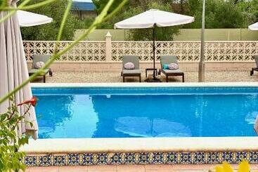 تختخواب و صبحانه Casa De Los Lirios