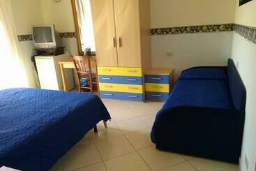 تختخواب و صبحانه Al Centro