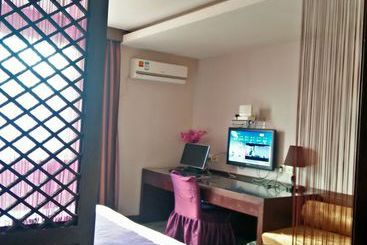 Baolong Homelike Youyi Hotel