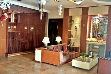 Baolong Homelike Youyi Hotel