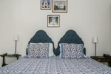 تختخواب و صبحانه Casa Shanti Niketan