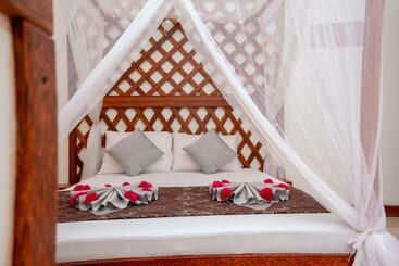 تختخواب و صبحانه Kuti Hotel Stone Town