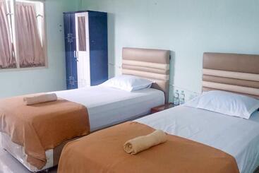 בית מלון כפרי Sutomo Indah Homestay Syariah Mitra Reddoorz