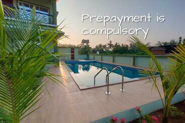 בית מלון כפרי Beach Haven  Nagaon Beach