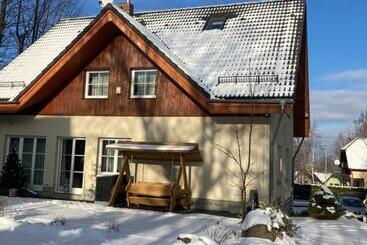 تختخواب و صبحانه Dom Pod Sosną