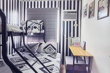 Отель Caren 8 Spatial Condo Maa 2br Fully Furnished Wtih Unli Pool Access