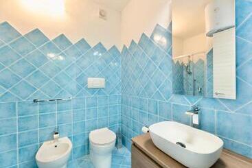 Isa Residence With Swimming Pool In Isola Rossa, Apartments With Air Conditioning And Private Outdoo