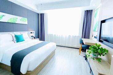 Отель Thank Inn Plus Xing An Senfa Four Season Flower City