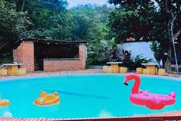 מלון דירות Encanto Do Parque Hospedagem