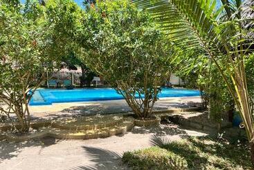 בית מלון כפרי Laguna Palace Michamvi Kae