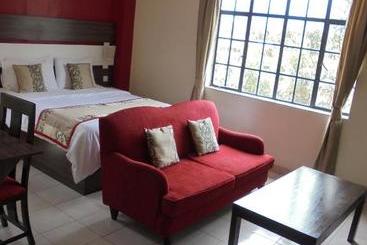 هتل Magharibi Suites