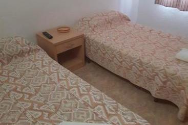 هاستل Hostal Pizzeria Oasis
