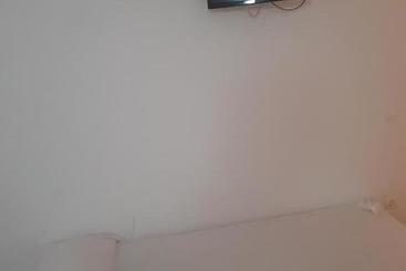 هاستل Hostal Pizzeria Oasis