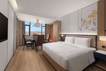 Отель Ramada Encore By Wyndham Dongguan Chang An