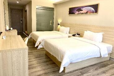 هتل Jtour Inn Maoming Huazhou Beijing Road Railway Station