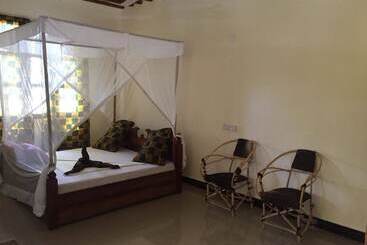 تختخواب و صبحانه Mpole Bungalows
