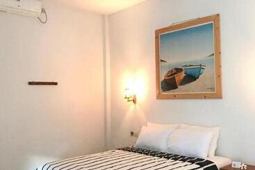 تختخواب و صبحانه Lazy Inn Kuta Lombok