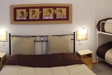 تختخواب و صبحانه Rooms Maison 3 Magnoni