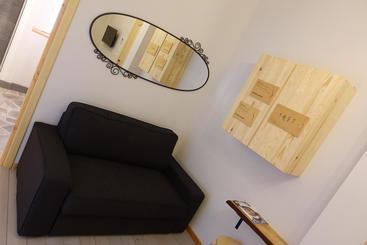 تختخواب و صبحانه Rooms Maison 3 Magnoni