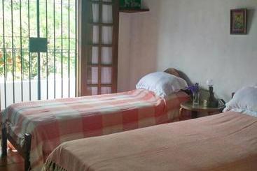 تختخواب و صبحانه Casa De Las Palmeras