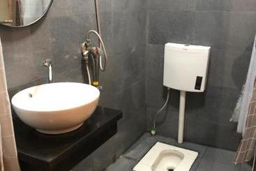 پانسیون Fenghuang Little Bear Family Guest House
