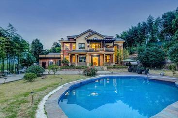 Пансион Moganshan Nianqi Guesthouse