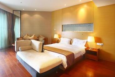 هتل Qingshuiwan Mandao Apartment