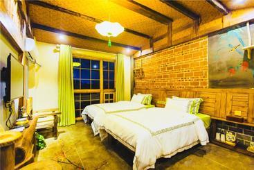 پانسیون Dielianhua Cowherd Inn Zhangjiajie