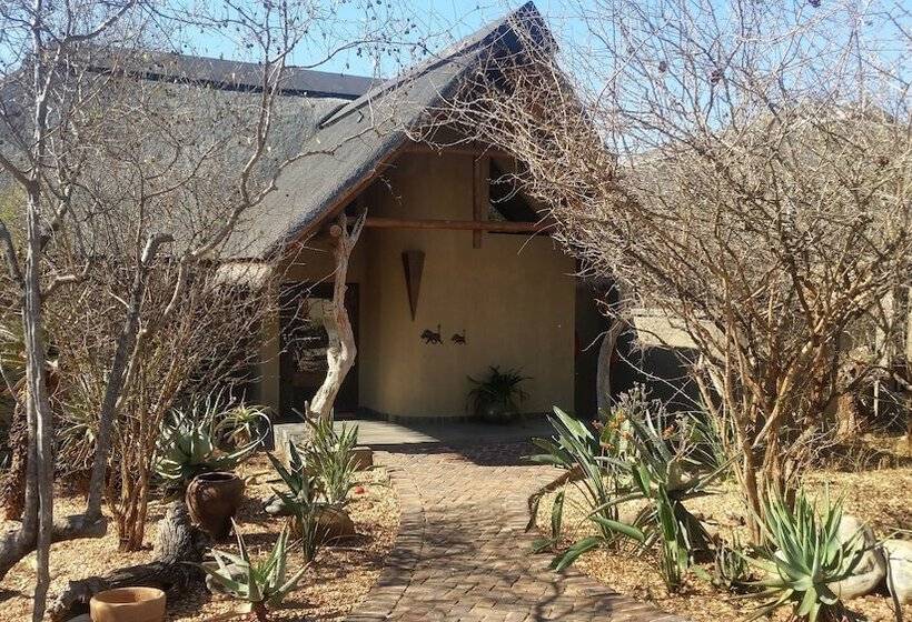 בית מלון כפרי Call Of The Wild Lodge