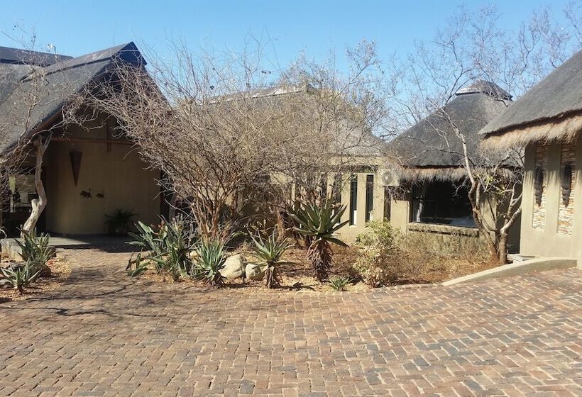 בית מלון כפרי Call Of The Wild Lodge