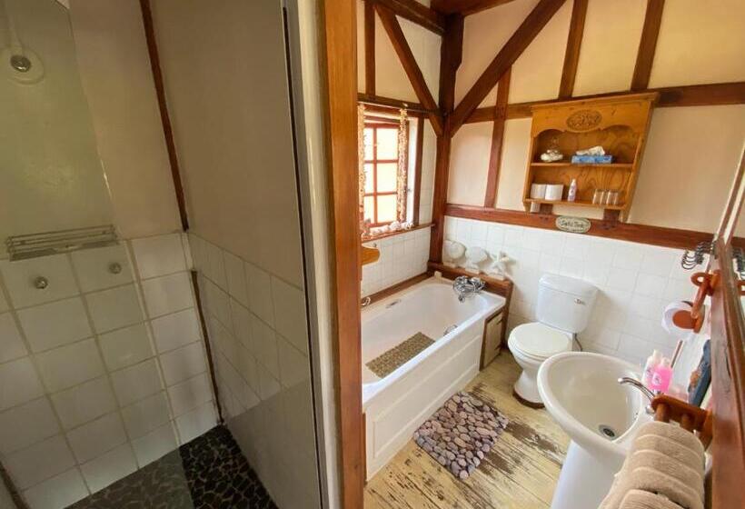 بنسيون Bohemian Garden Cottages