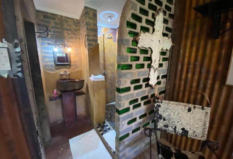 بنسيون Bohemian Garden Cottages