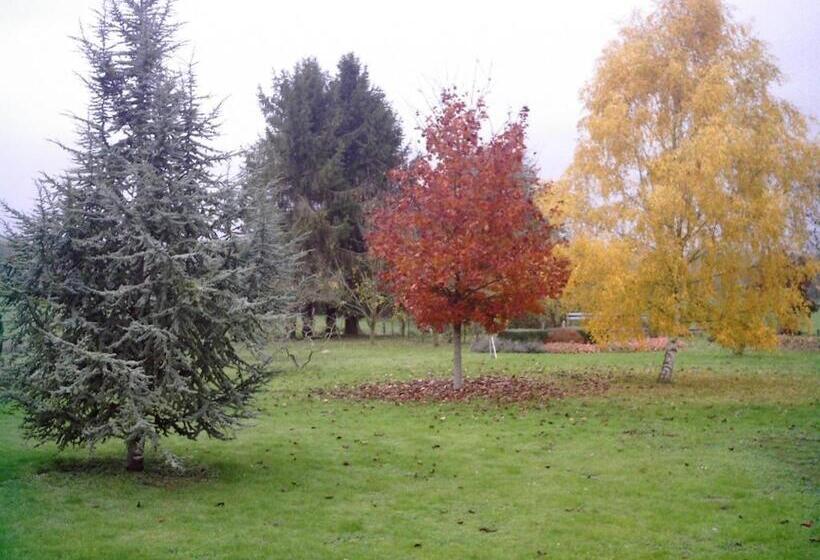 فندق Au Jardin Fleuri