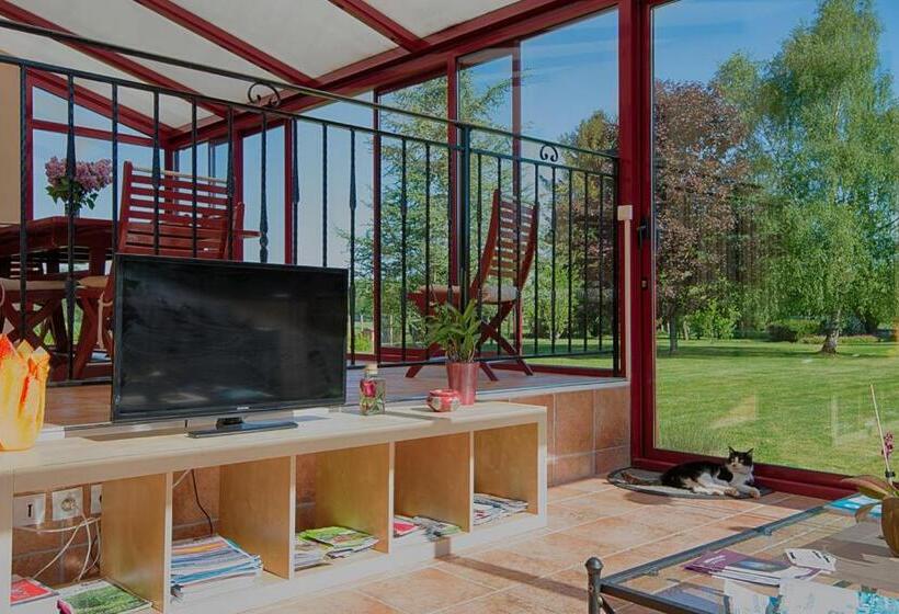 فندق Au Jardin Fleuri