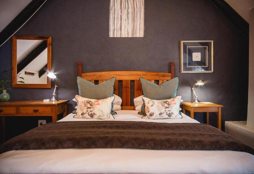 פנסיון Cypress Cottage Guest House